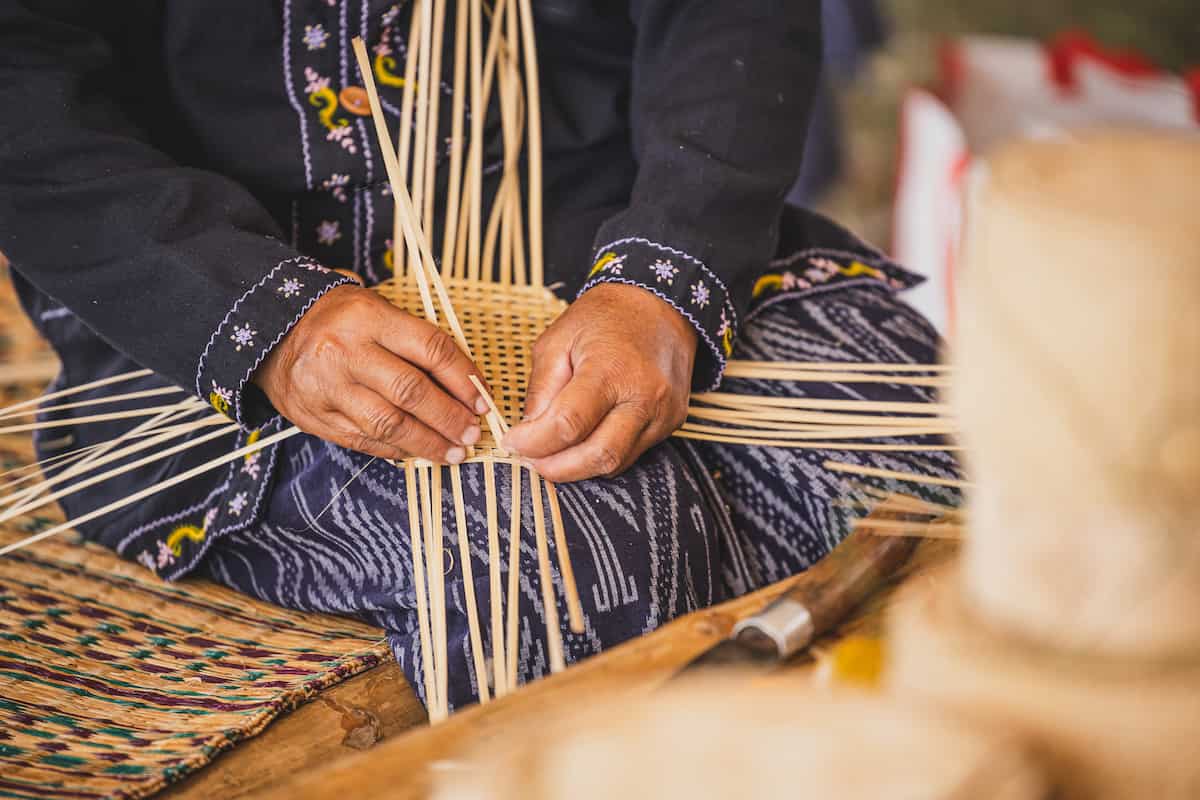 Woman Weaving Basket