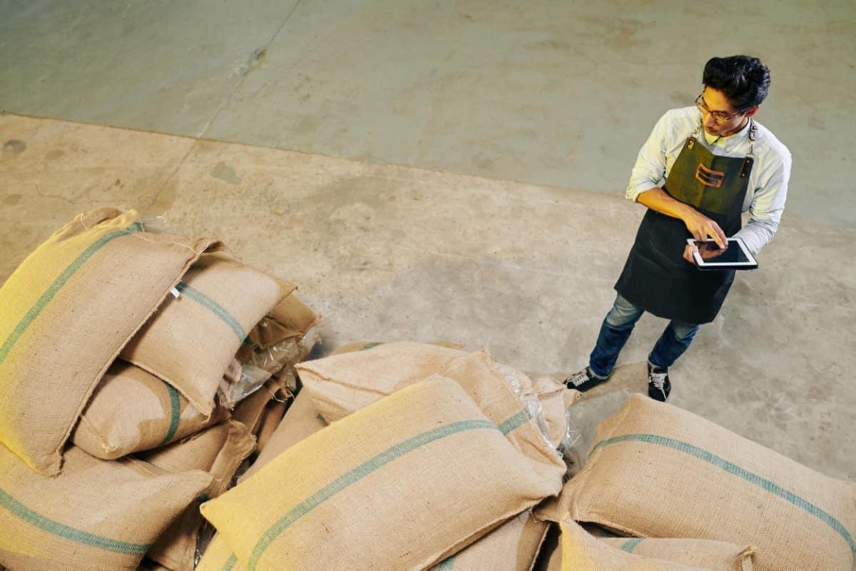 Roastery Owner Working at Warehouse