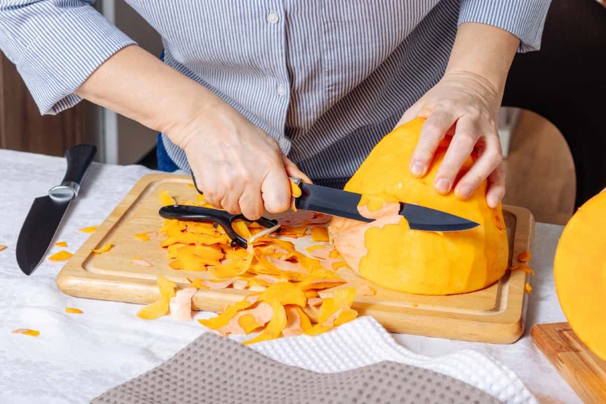 Peeling Pumpkin in Home Kitchen
